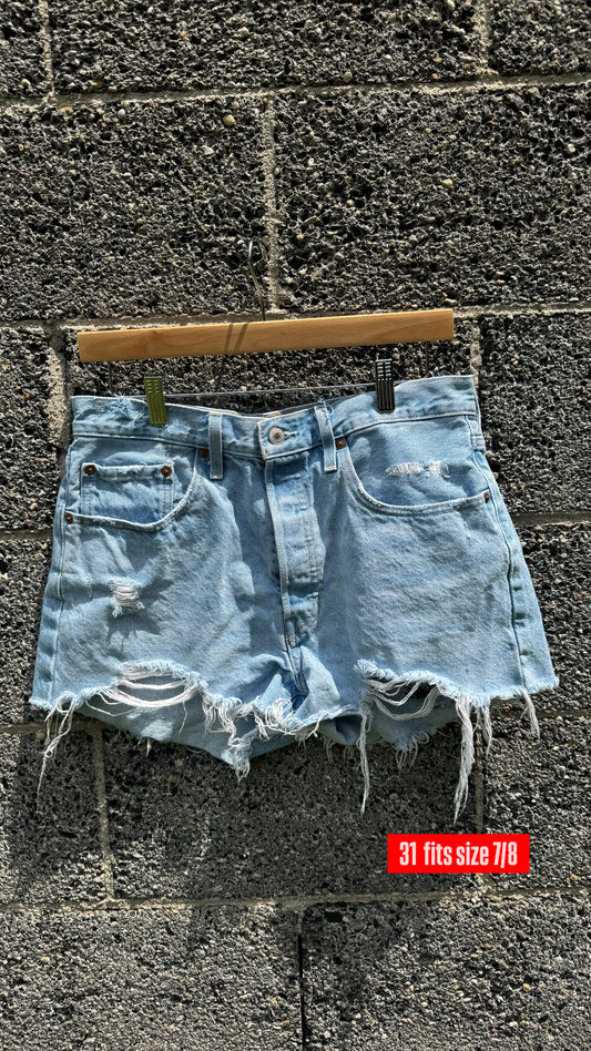 Distressed women’s Levi shorts: SIZE 31 ( 7/8 )